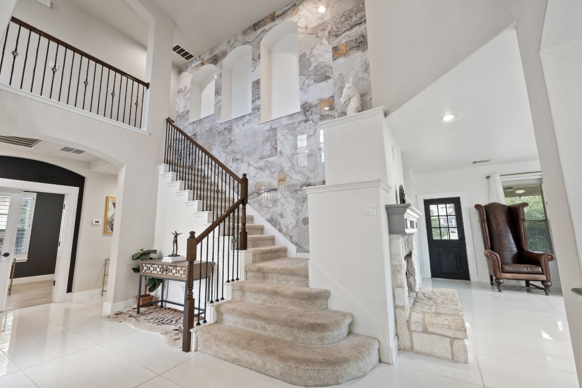 a view of entryway and hall with dining room