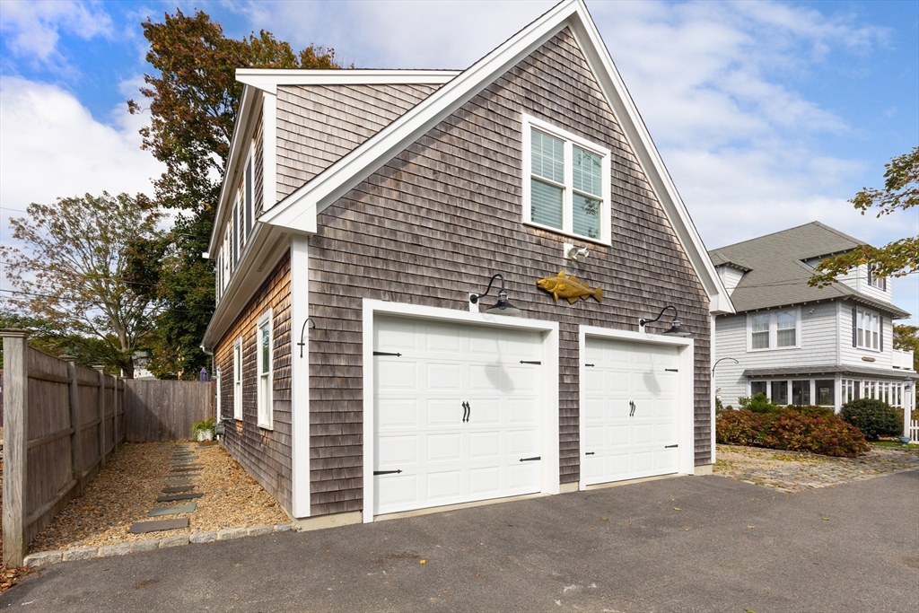 a front view of a house with a garage