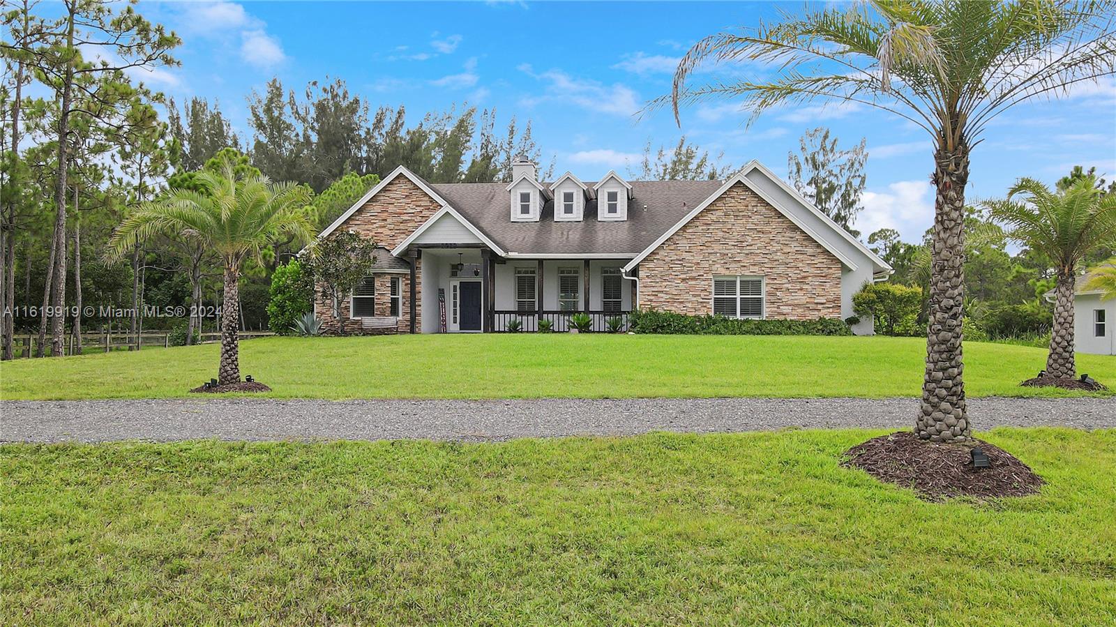 a view of a house with a big yard