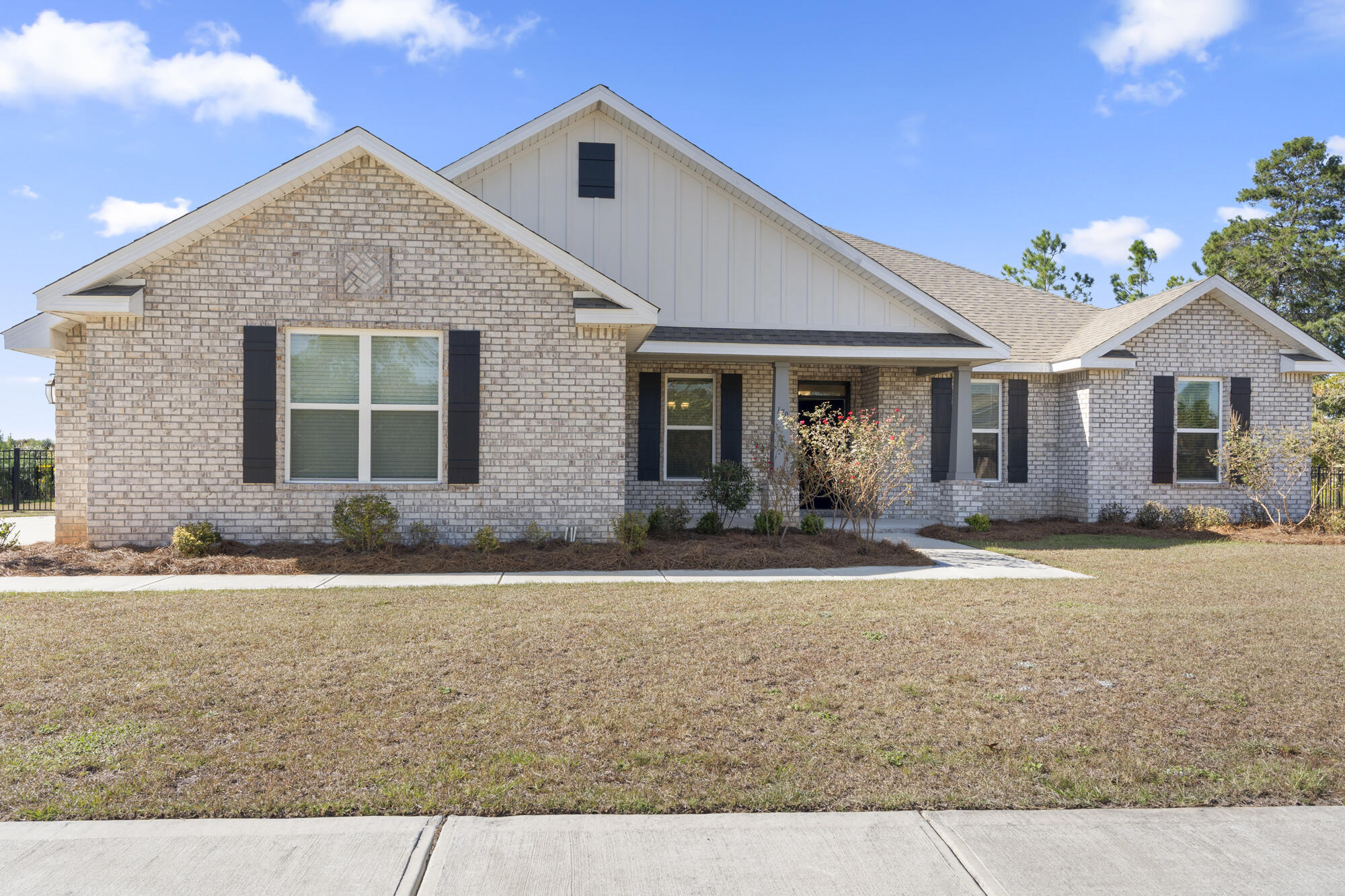 front view of a house with a yard