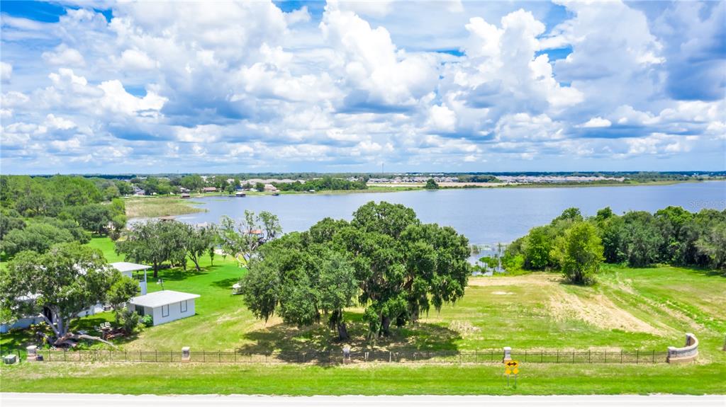 a view of a lake with outdoor space