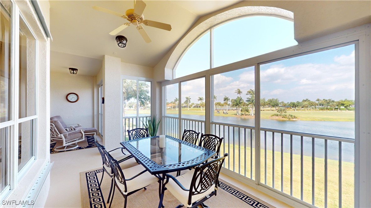 a view of a dining room with furniture window and outside view