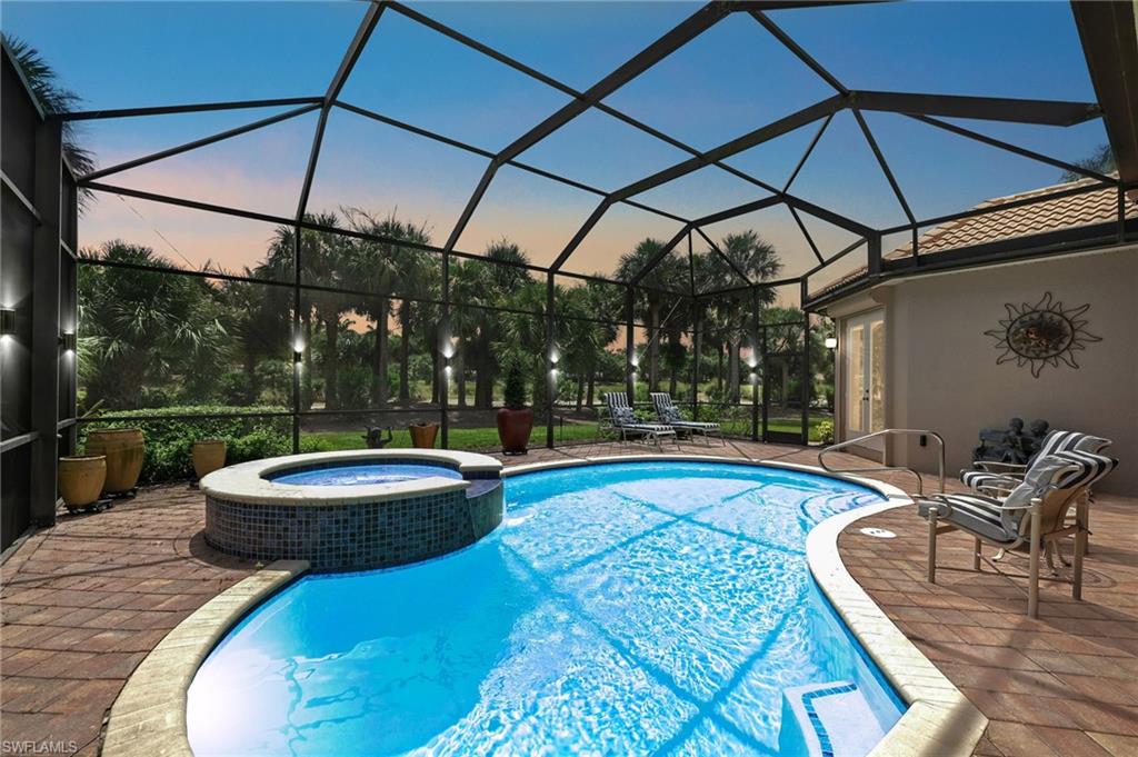 a view of a swimming pool with a patio