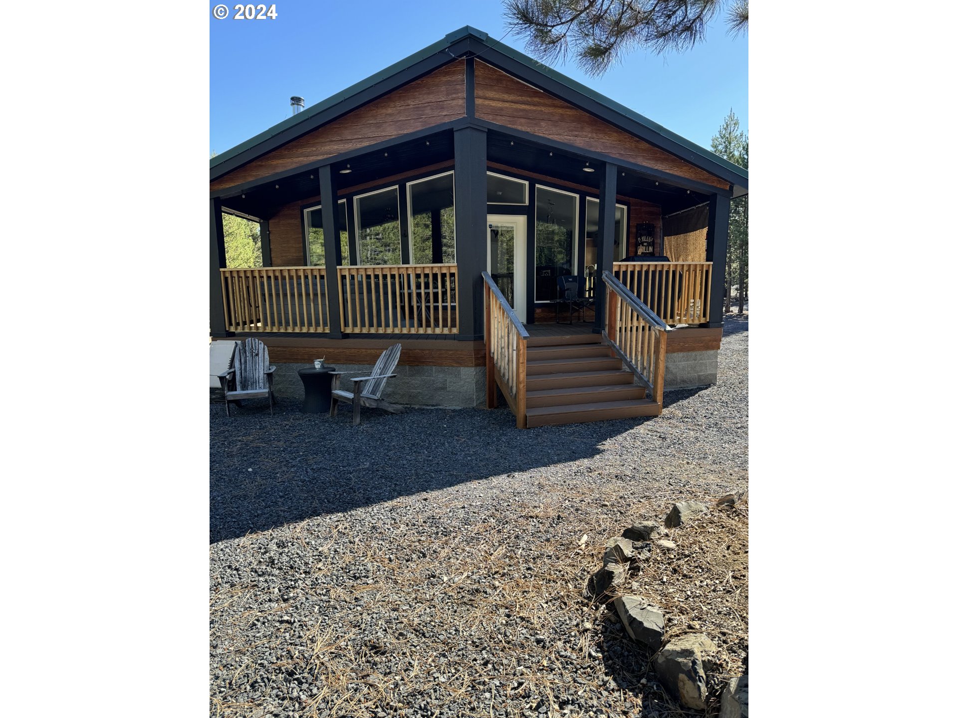 a view of a backyard with a deck