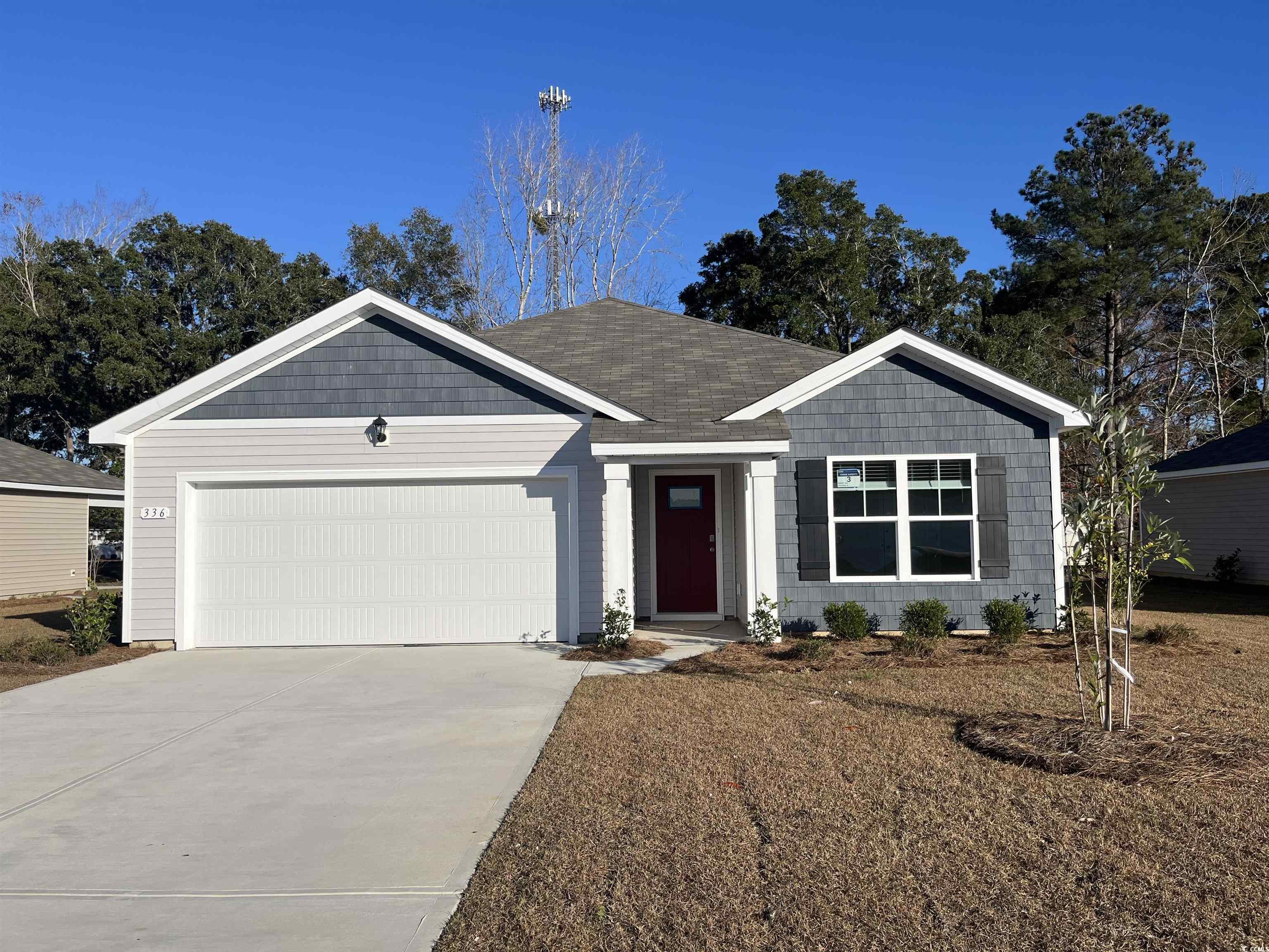 Single story home with a garage