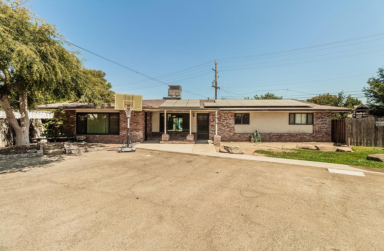 front view of a house with a patio