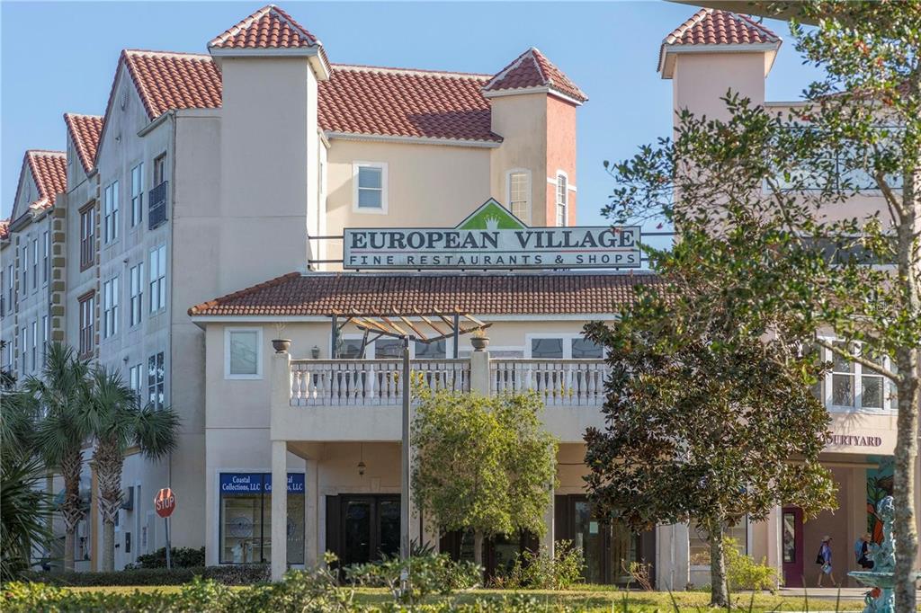 a front view of a building with garden