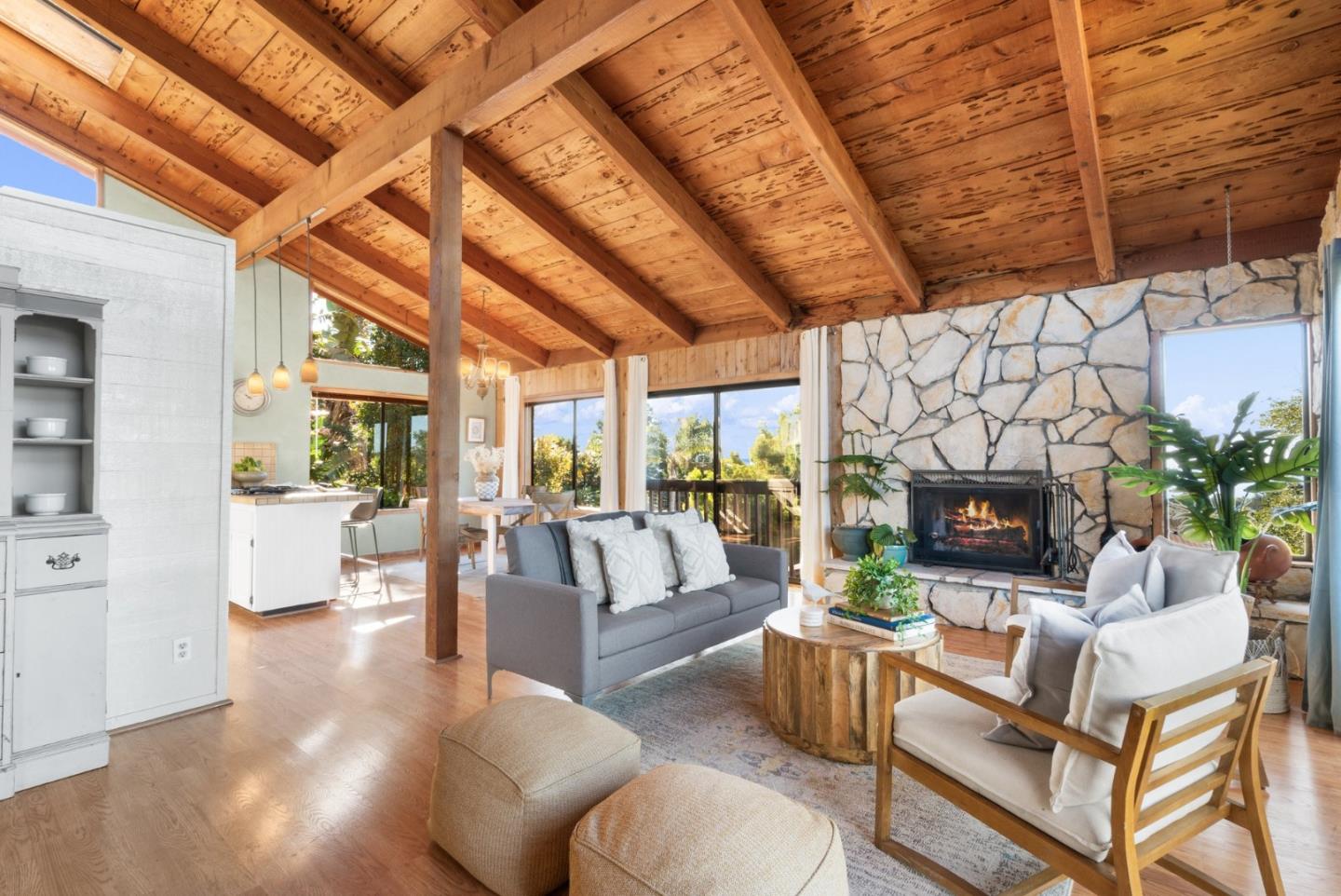 a living room with fireplace furniture and a fireplace