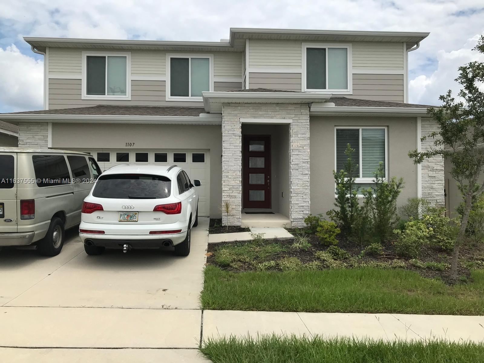 a car parked in front of a house