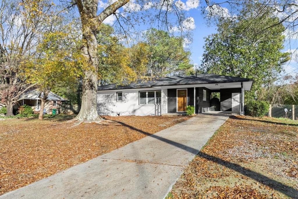 front view of house with a yard