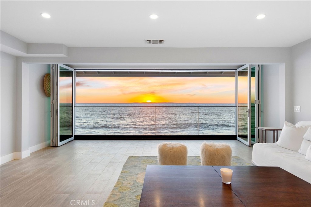 a view of living room with furniture and window