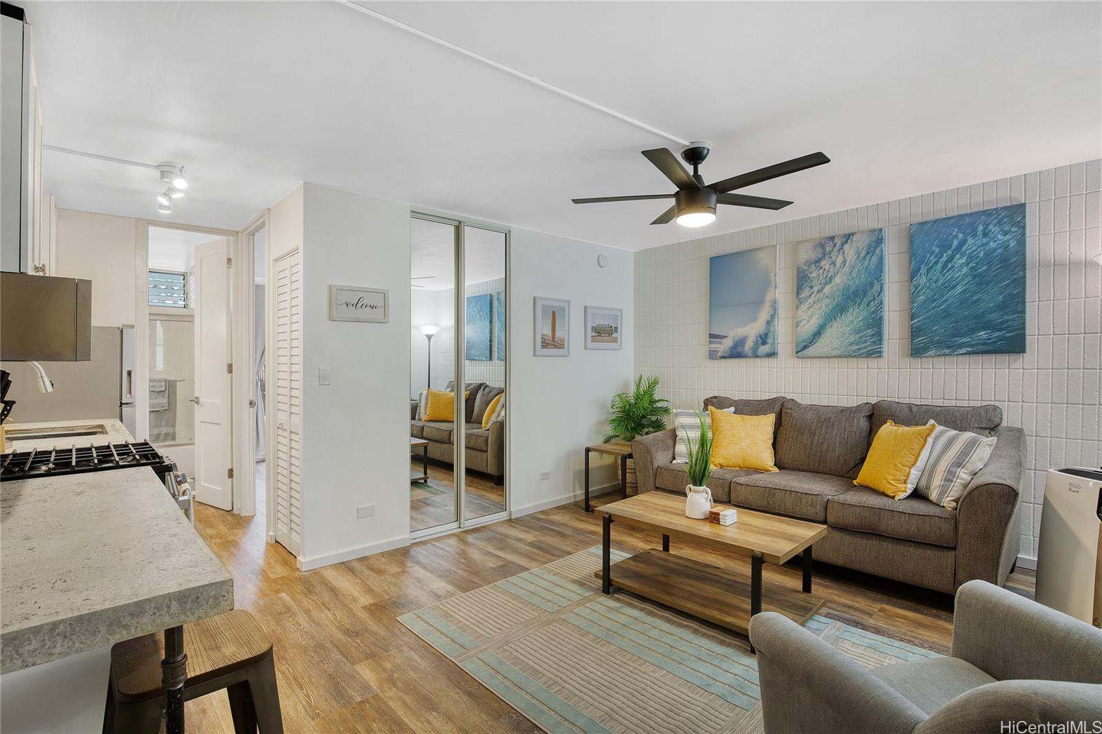 a living room with furniture and a flat screen tv