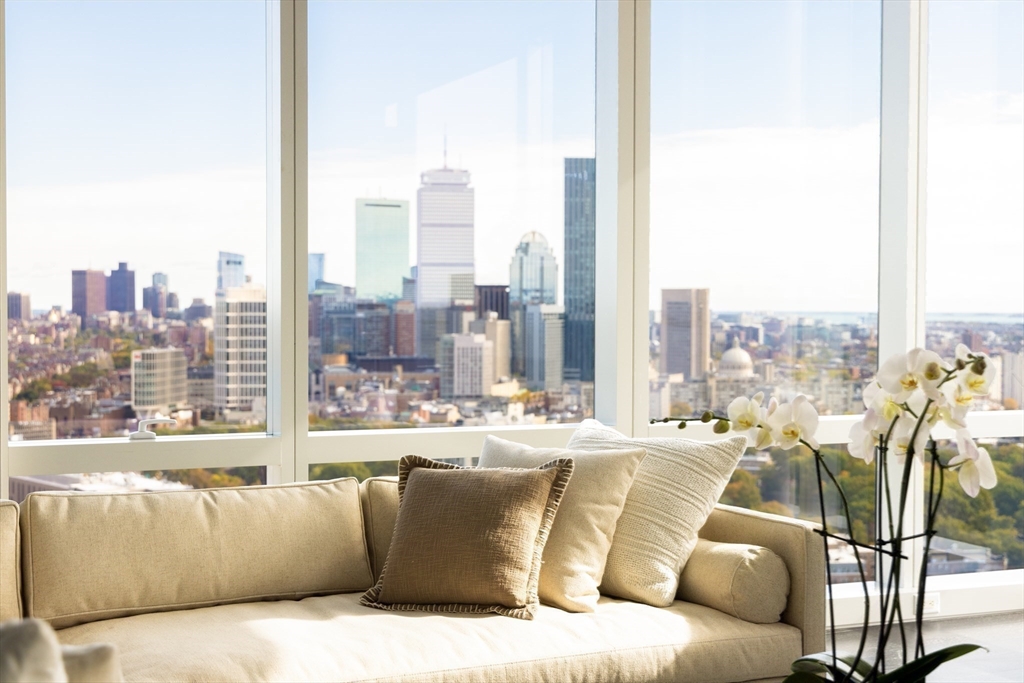 a view of a living room with a large window