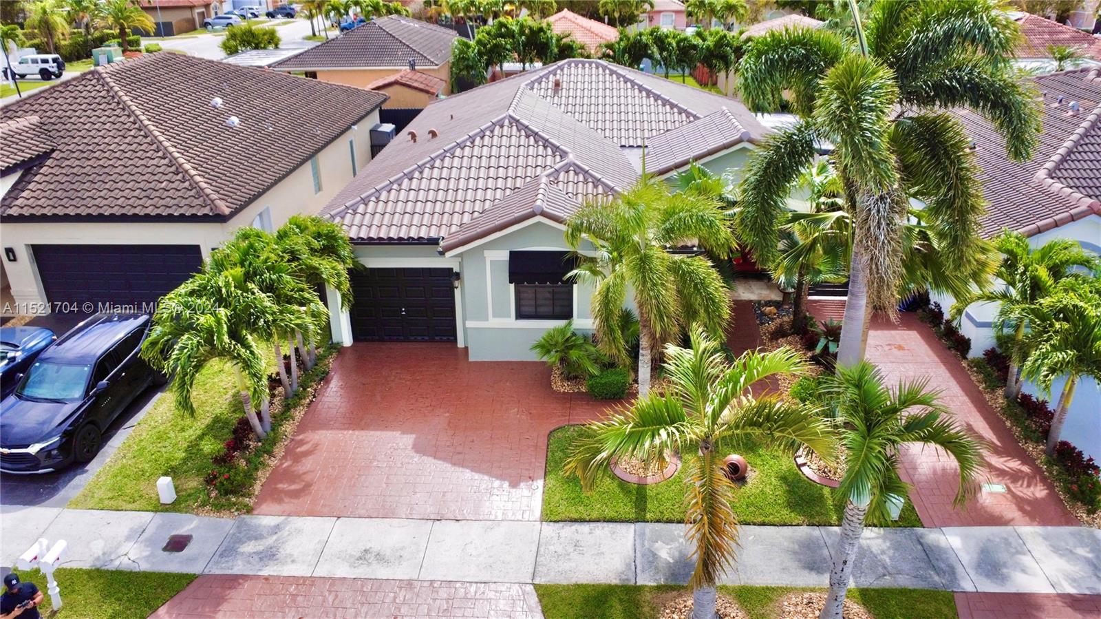 front view of a house with a garden