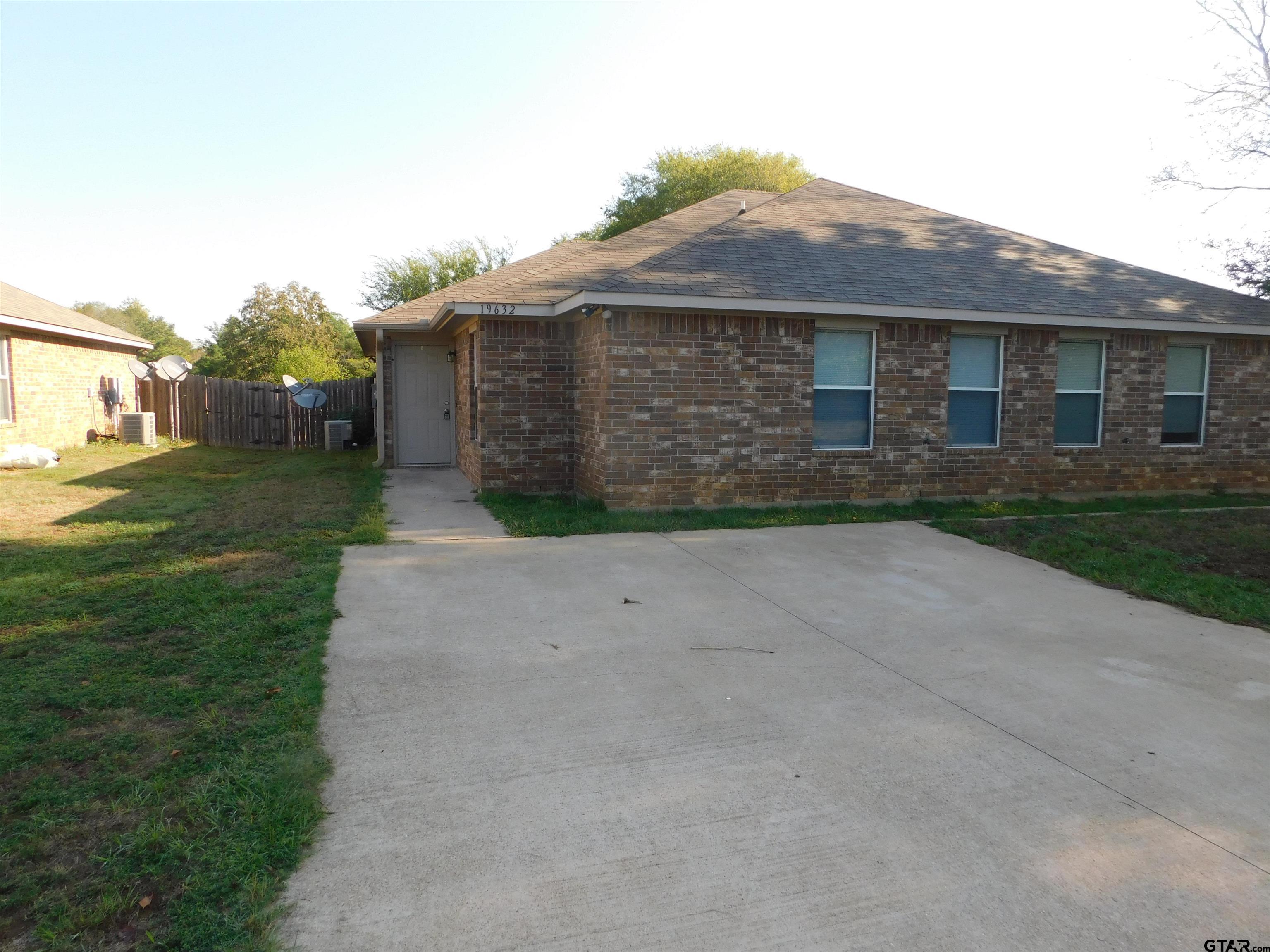 a front view of house with yard