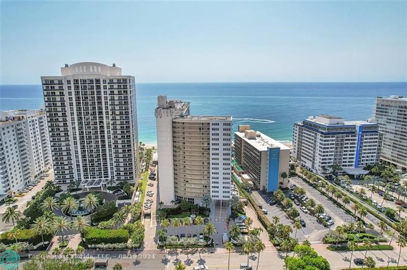 a view of a city with tall buildings