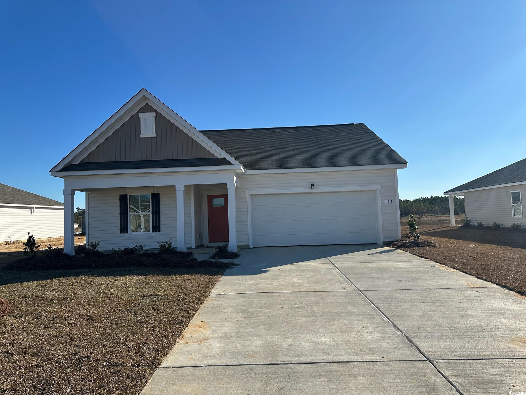 View of front of home featuring a garage