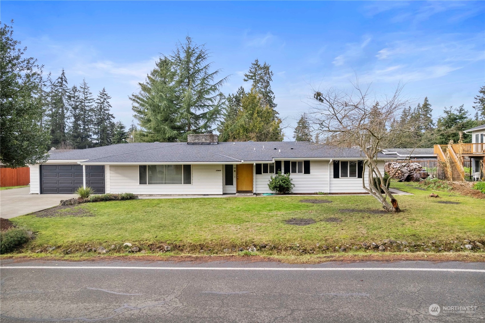 front view of a house with a yard