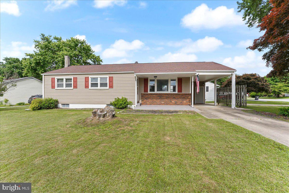 a house view with swimming pool and wooden fence