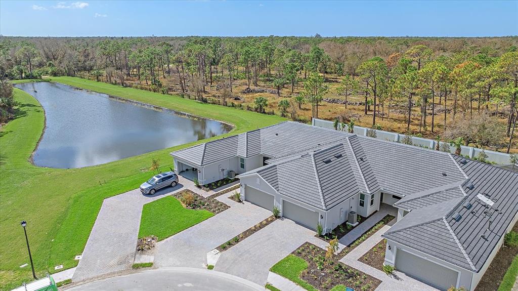 an aerial view of a house with a garden