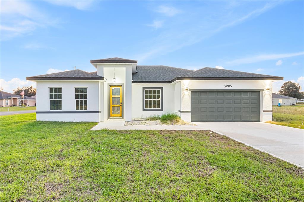 front view of a house and a yard