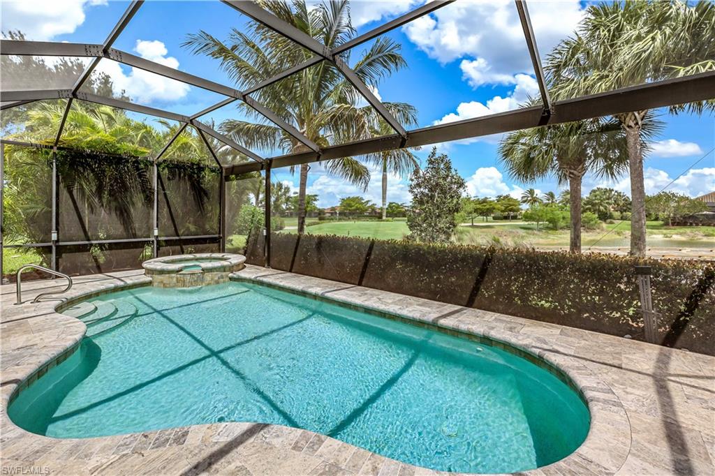 a view of a backyard with a small pool