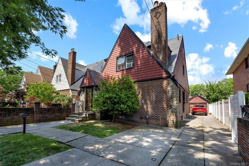 View of english style home