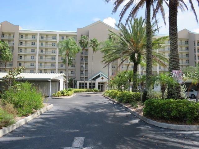 a street view with tall buildings and a street