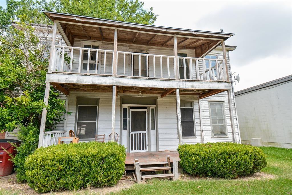 Historic 2 story home built in 1910 in the heart of old town East Bernard, TX!! This home features high ceilings, large rooms, a covered front porch, large 2nd floor balcony overlooking the front yard and a good sized backyard.  This is a great opportunity for an investor to fix and flip or hold or for the owner occupant wanting to remodel and build in equity for down the road. Only a block away from Hwy 90 and adjacent to several local businesses, this property could also be considered commercial.