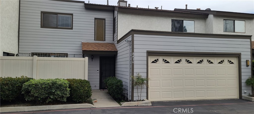 a view of a building with a garage