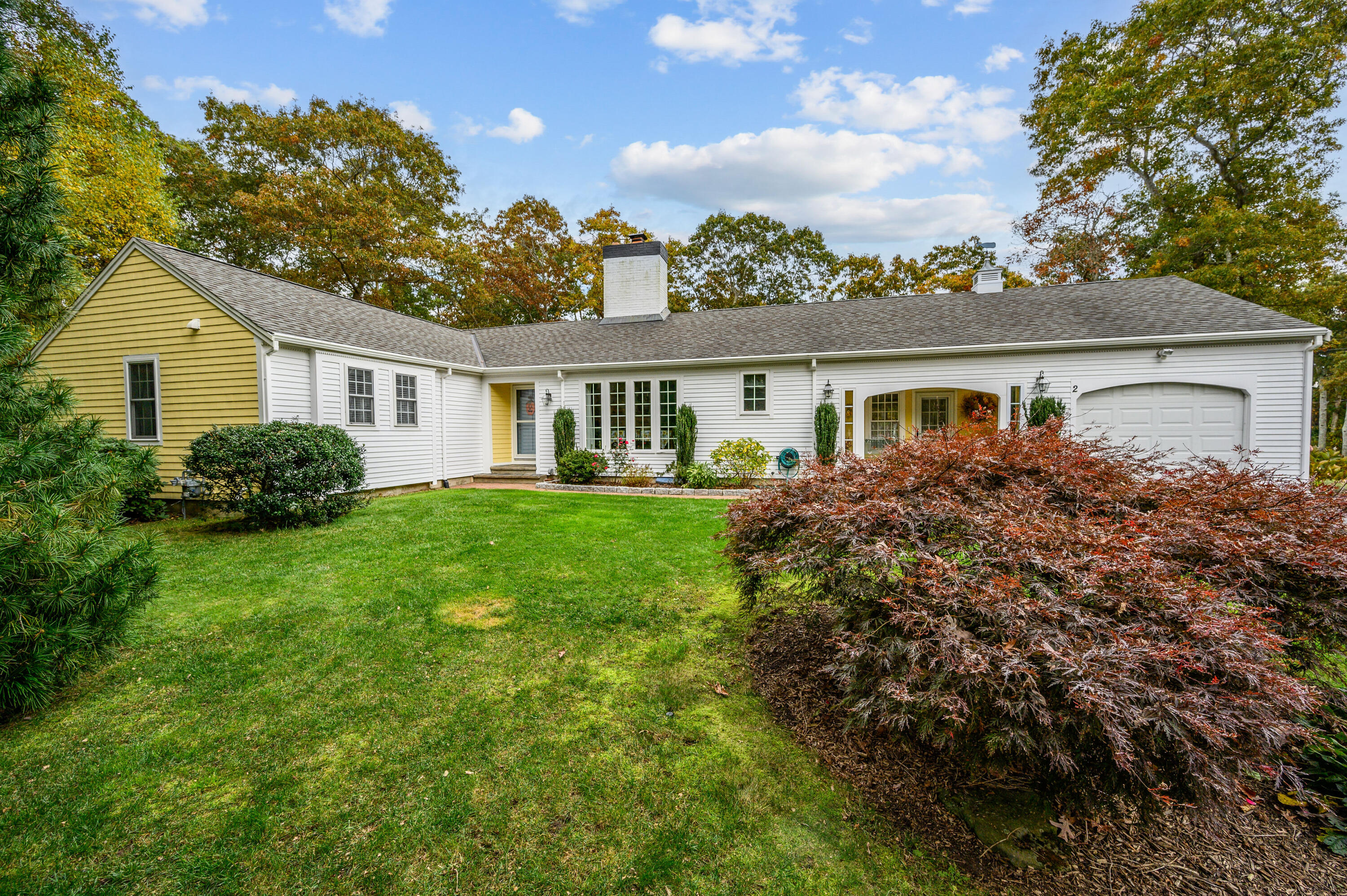 a house view with a garden space