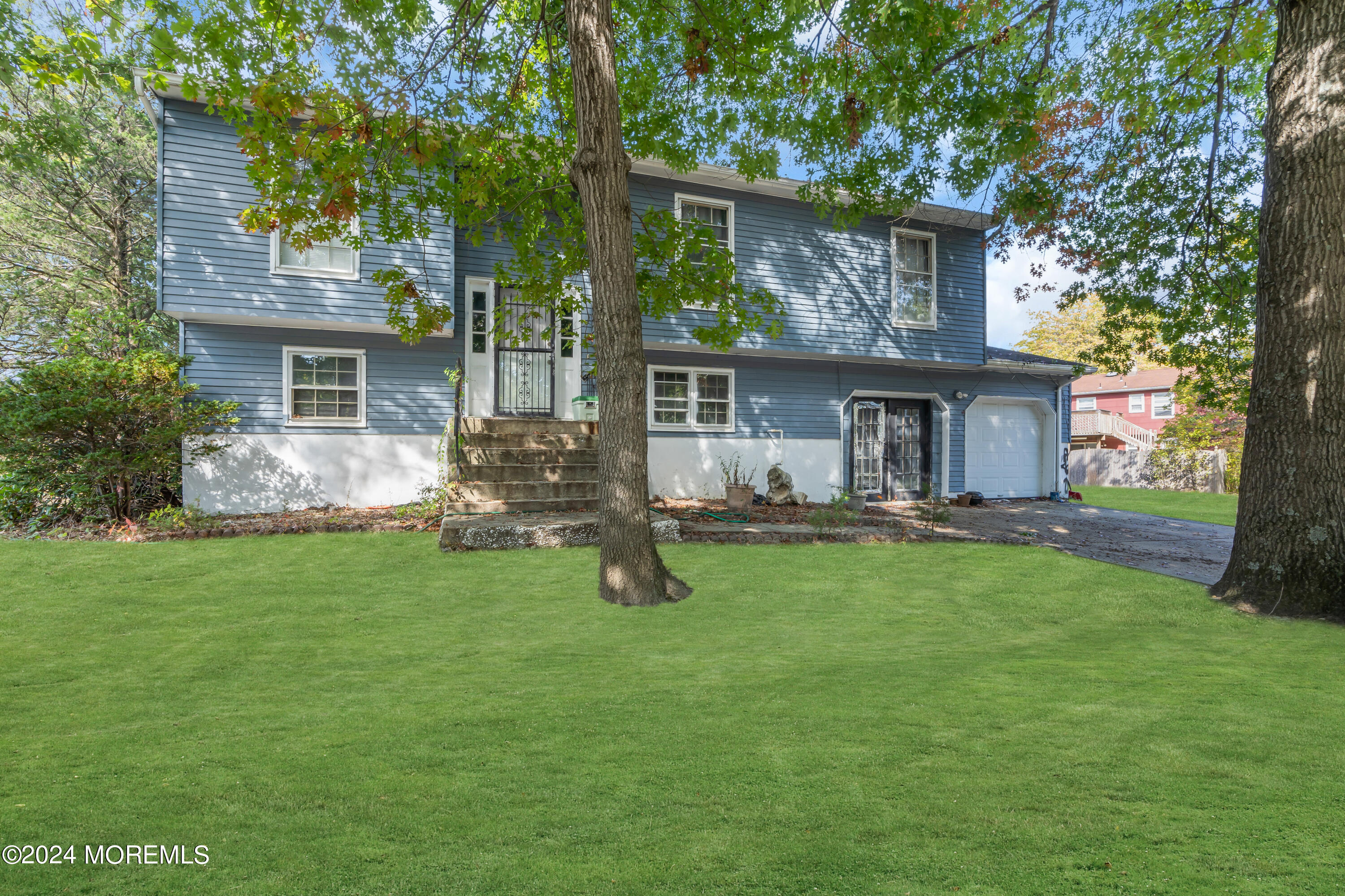 front view of a house with yard