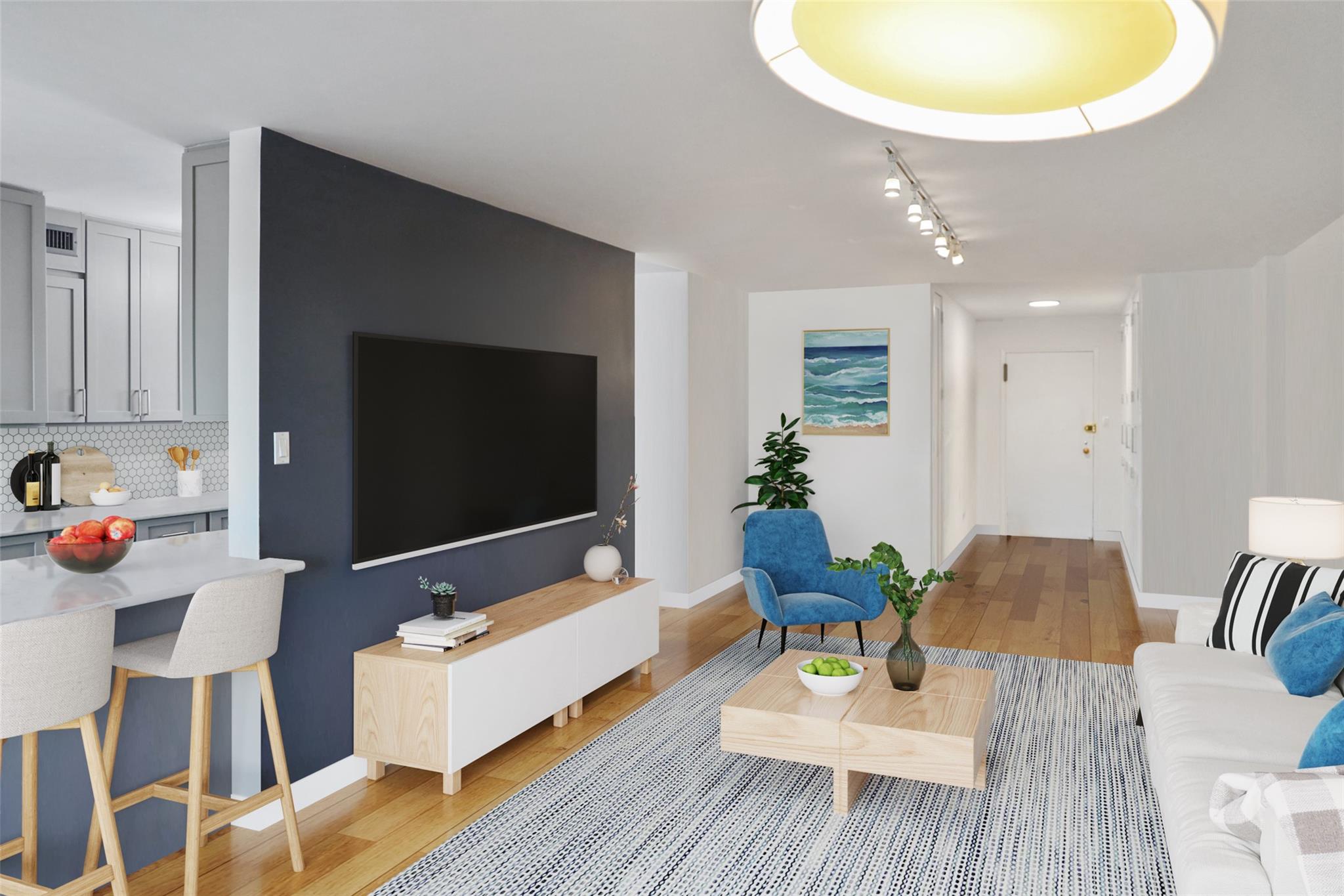 a living room with furniture and a flat screen tv