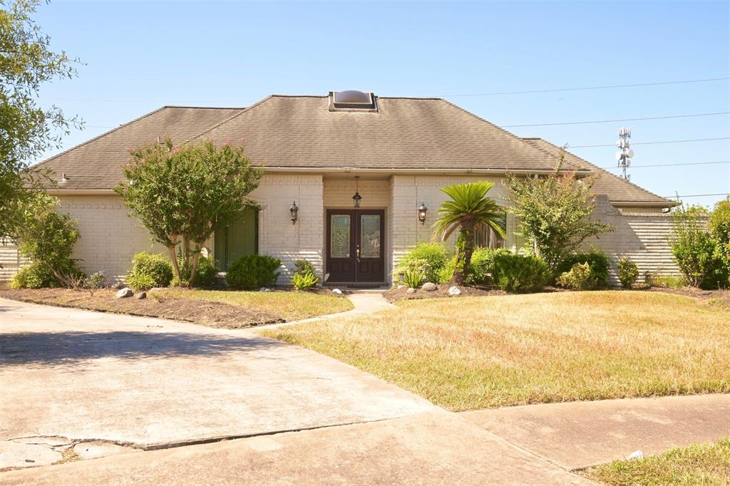 a view of a house with a street