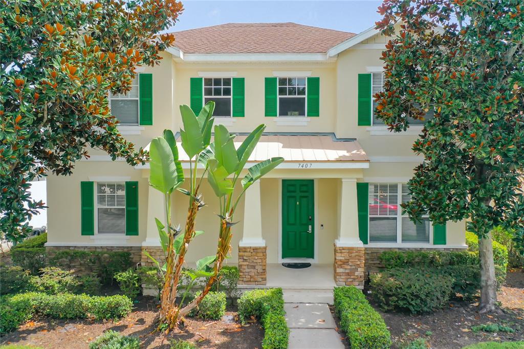 front view of a house with a garden