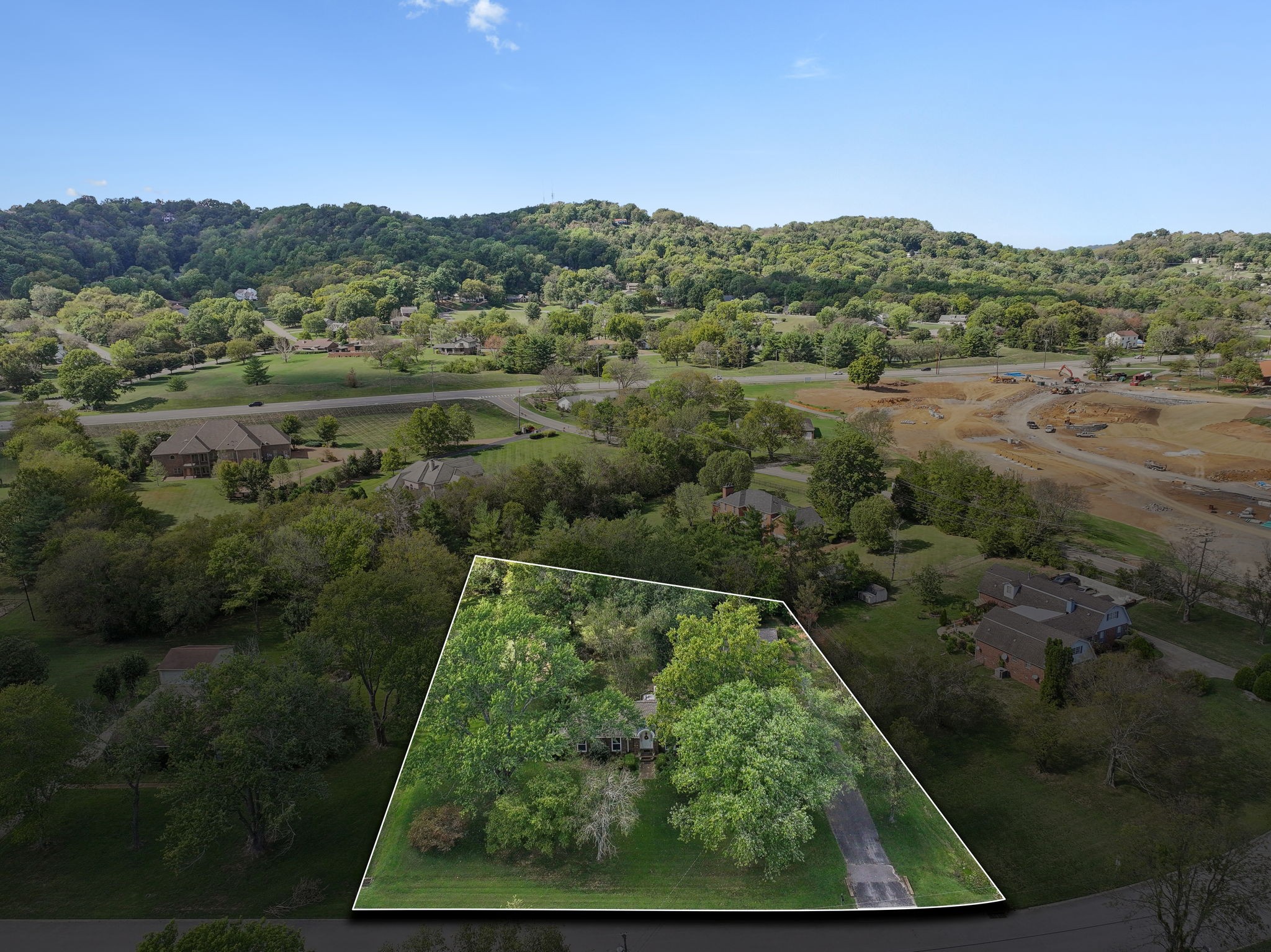 an aerial view of mountain with trees