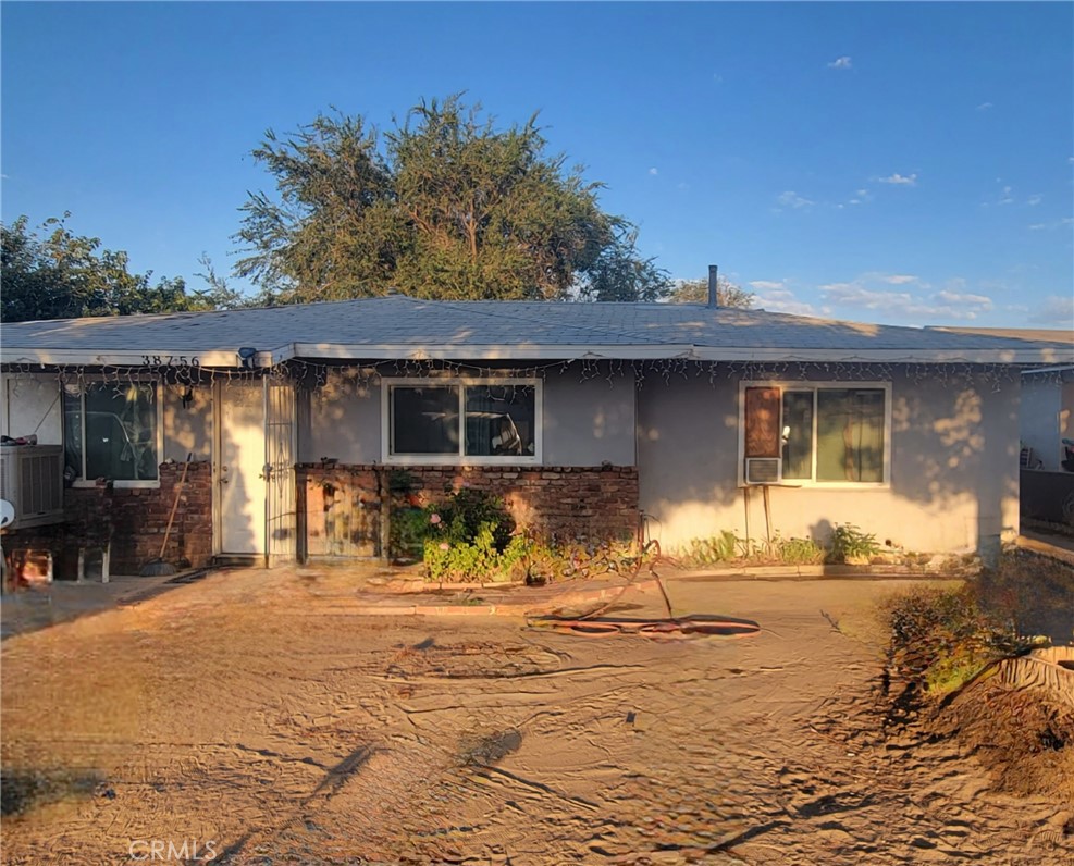 a front view of a house having patio