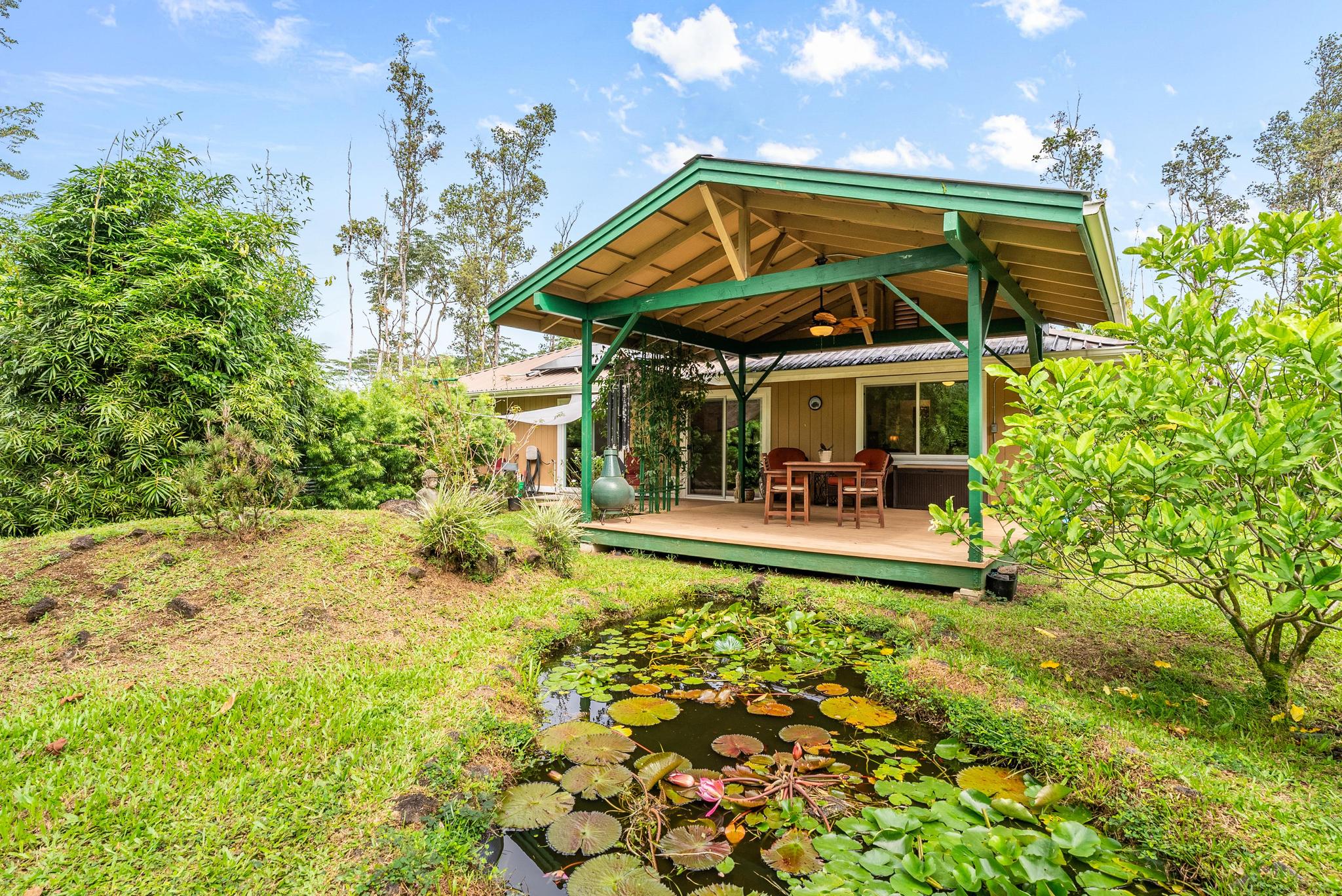 a view of a chair and table of the garden