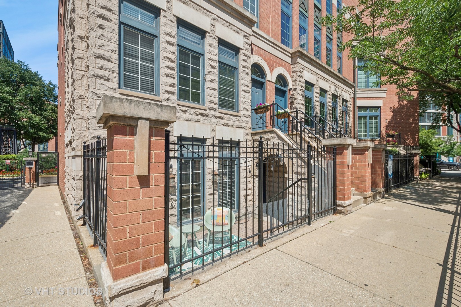 a view of a brick building with many windows