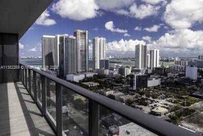 a city view from a balcony