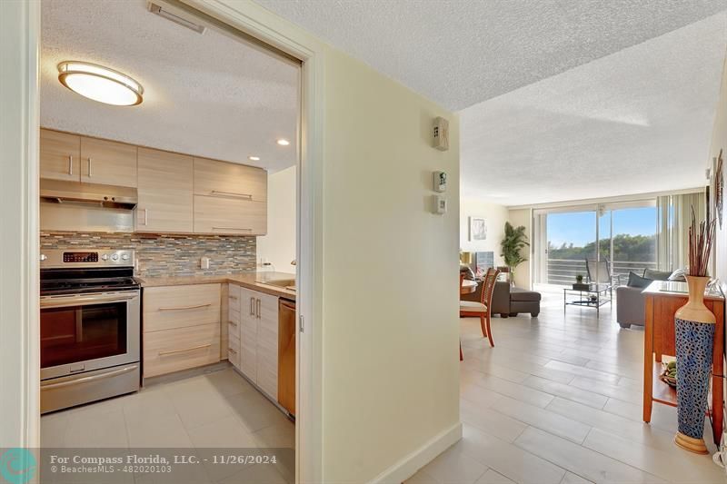 a kitchen with sink and cabinets