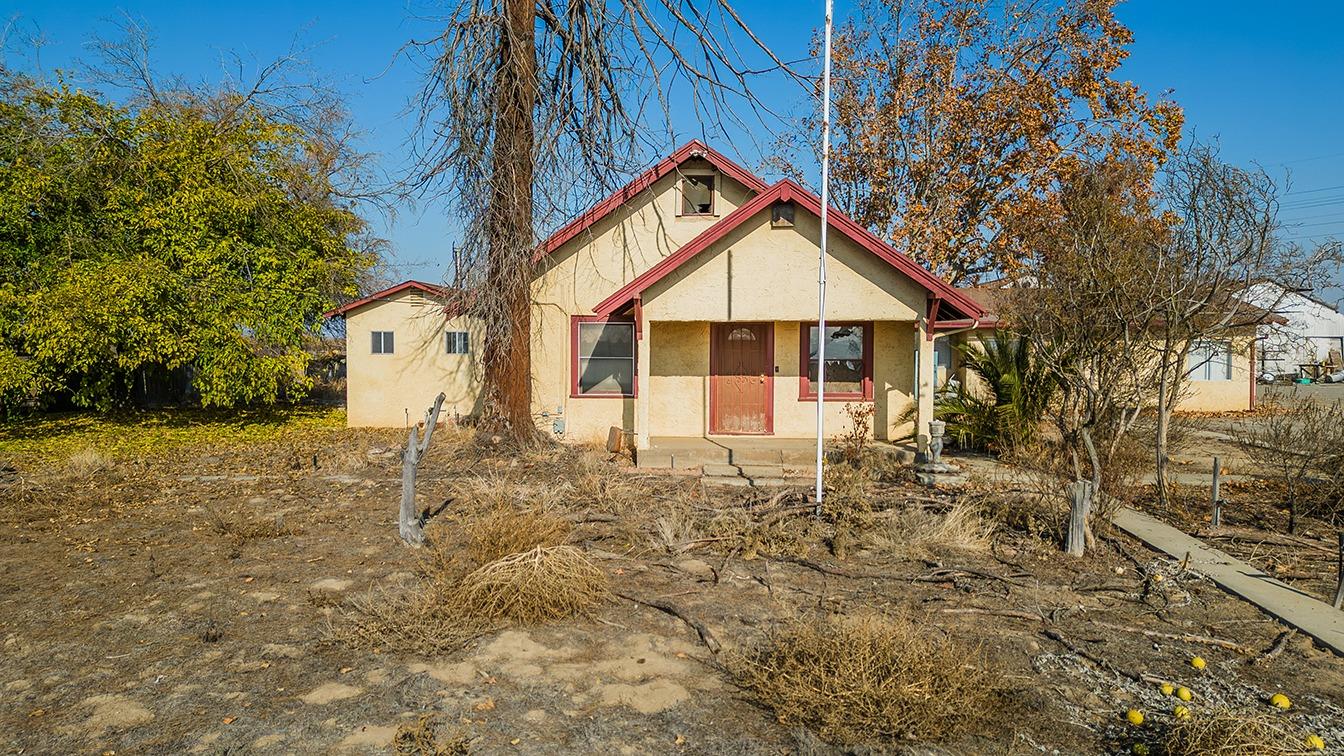 a house with trees in front of it