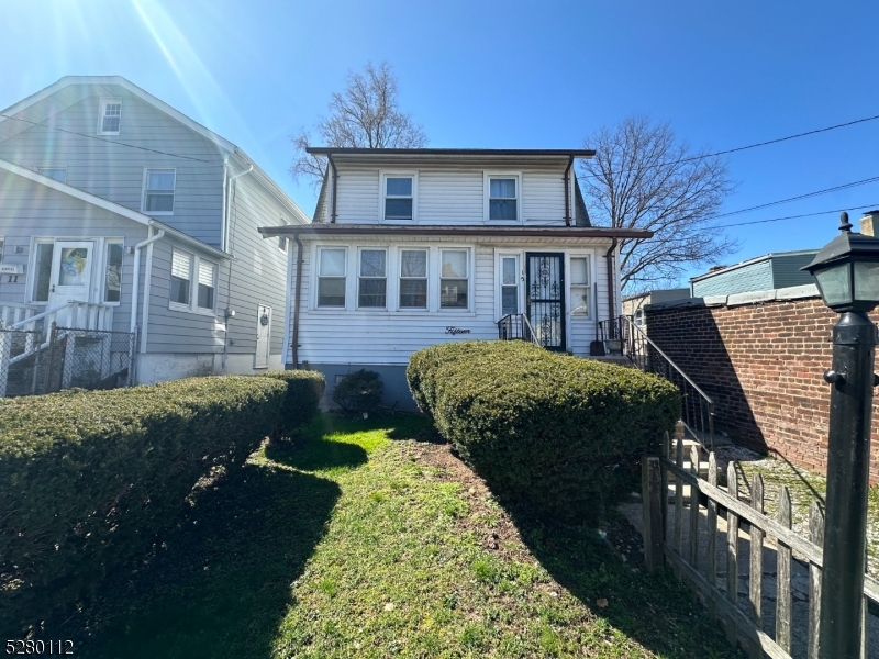 a view of a house with a garden