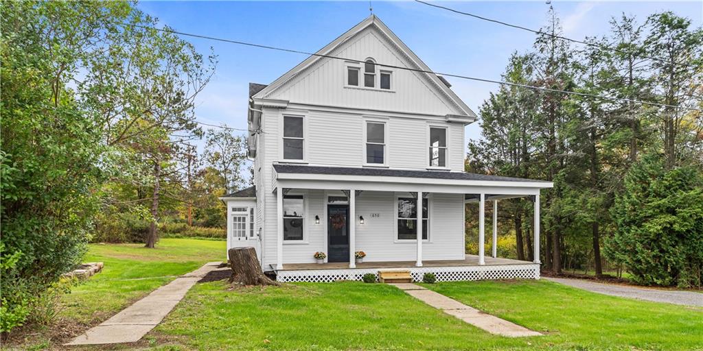 front view of a house with a yard