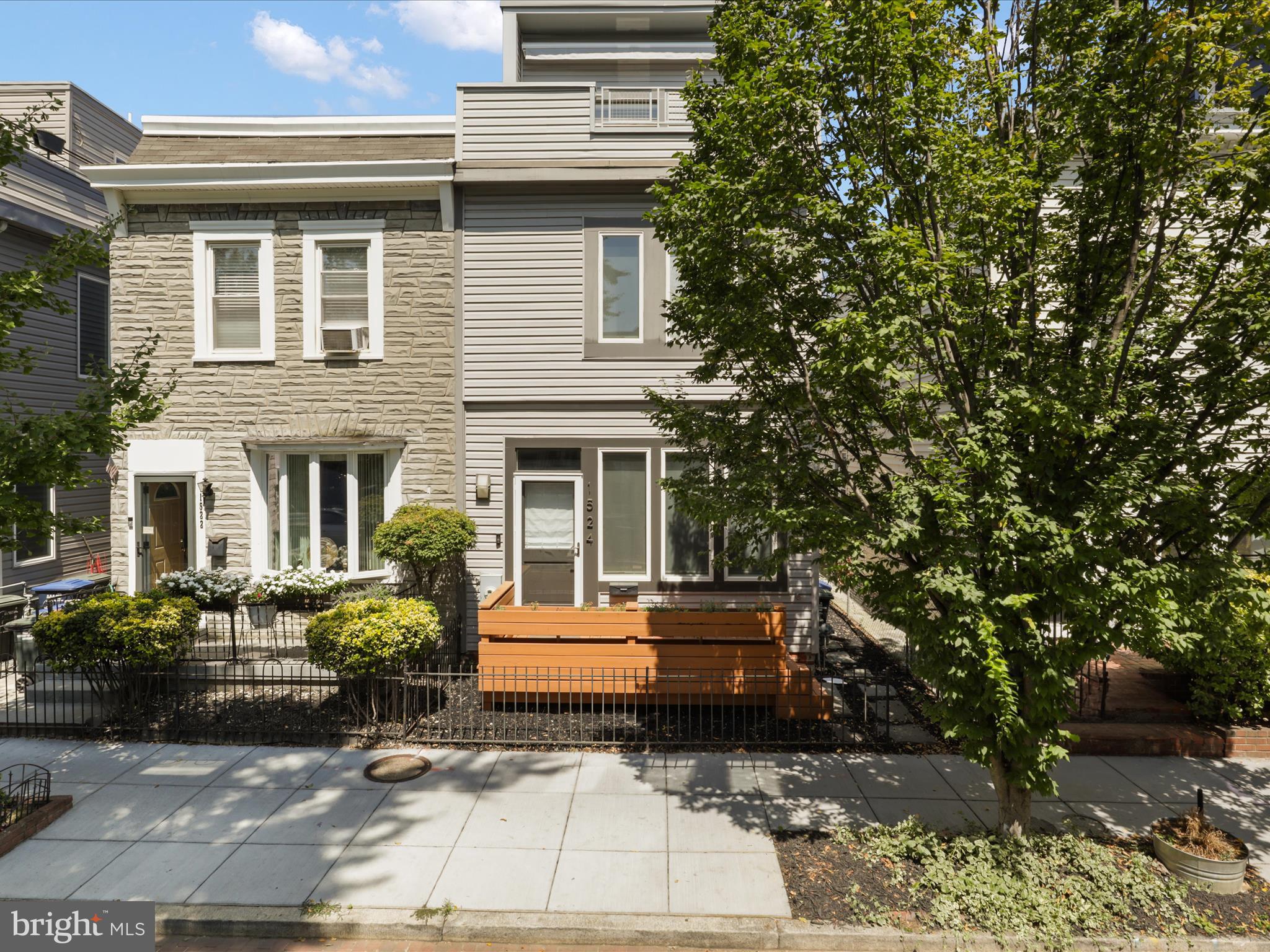 a front view of house with outdoor space