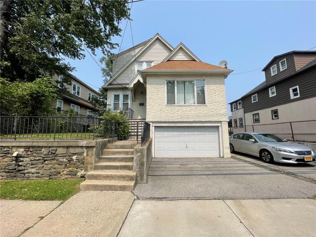 View of front of home with a garage