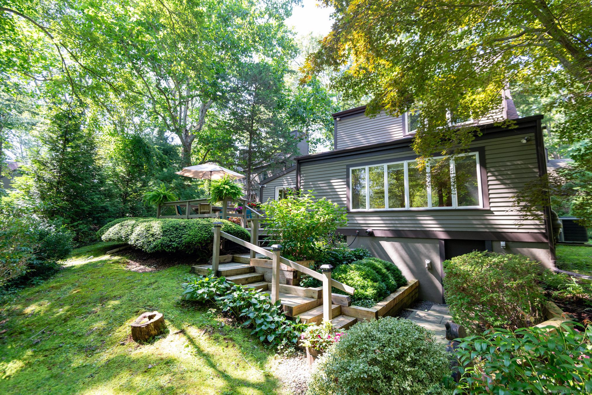 a backyard of a house with lots of green space