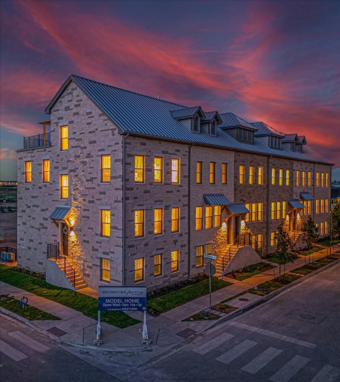 a view of building with yard