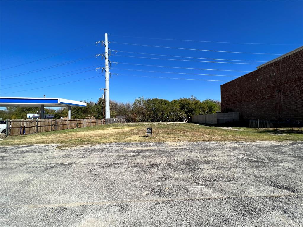 a view of a swimming pool with a yard