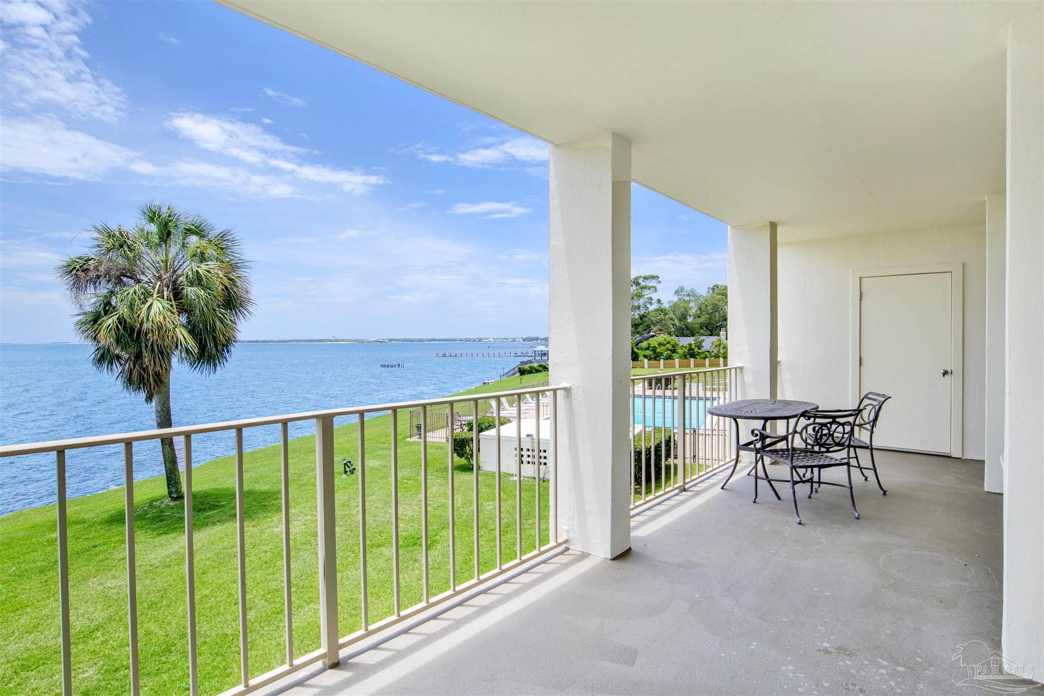 a view of balcony with furniture